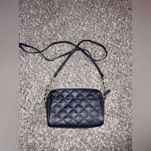 Women’s small black crossbody bag